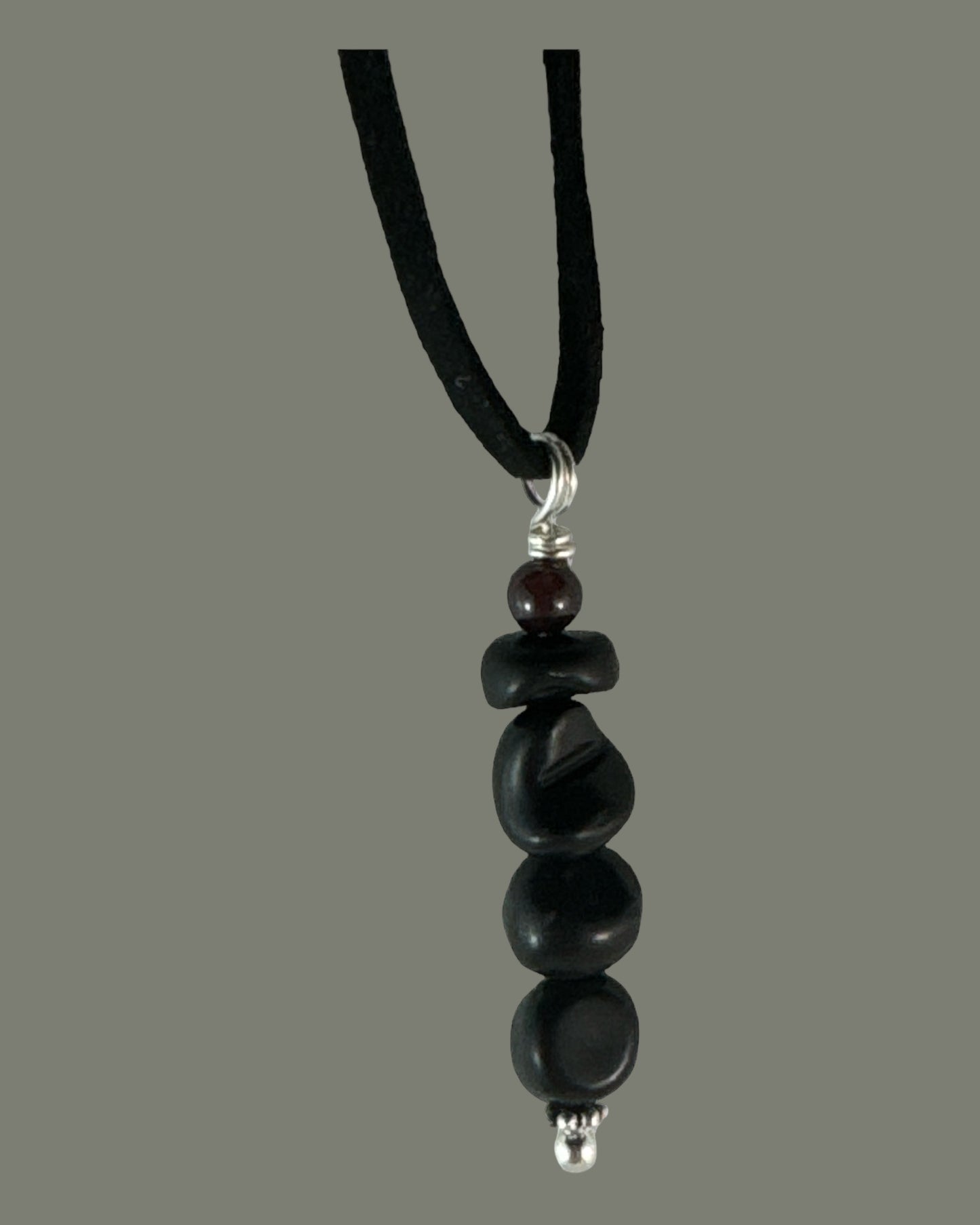Shungite pendant (tumbled vertical drop paired with Garnet)