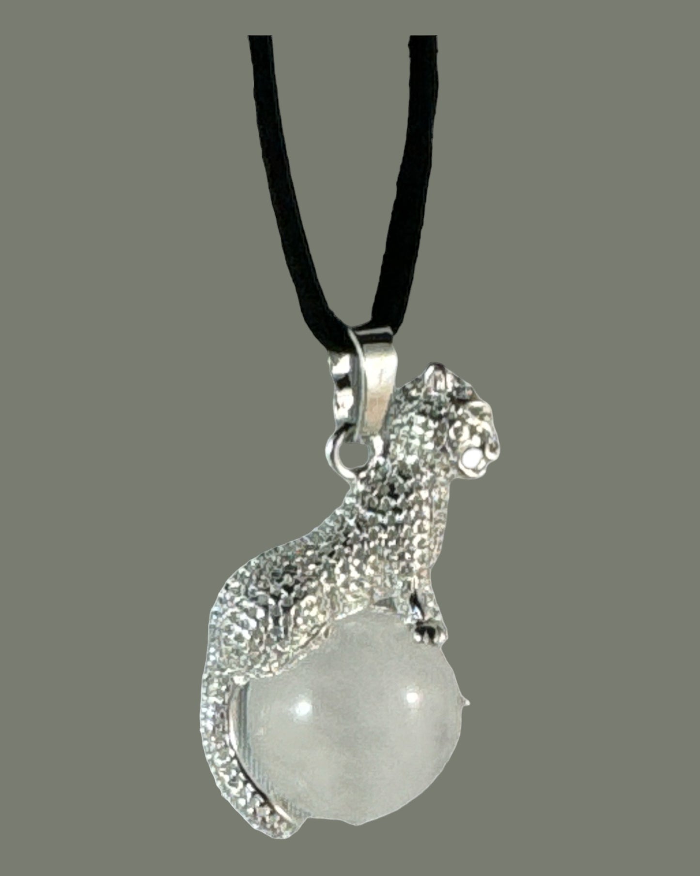 Snow Quartz Jaguar pendant (Jaguar sitting on full moon)